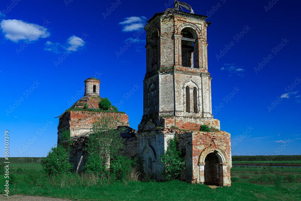 Vintage, destroyed, overgrown with grass to the Christian Orthodox Church