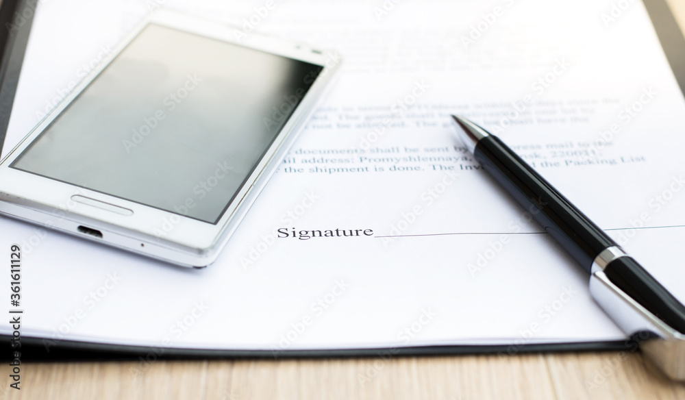 Pen on contract paper. Contracts Business concept Pen on contract paper. Contracts Business concept