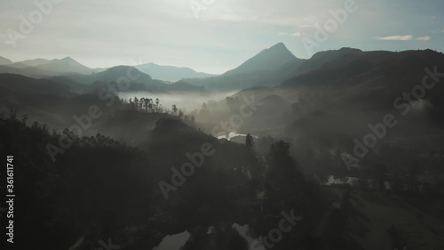 Aerial view of the dawn and the mountains near the city of Munnar. Kerala. India.