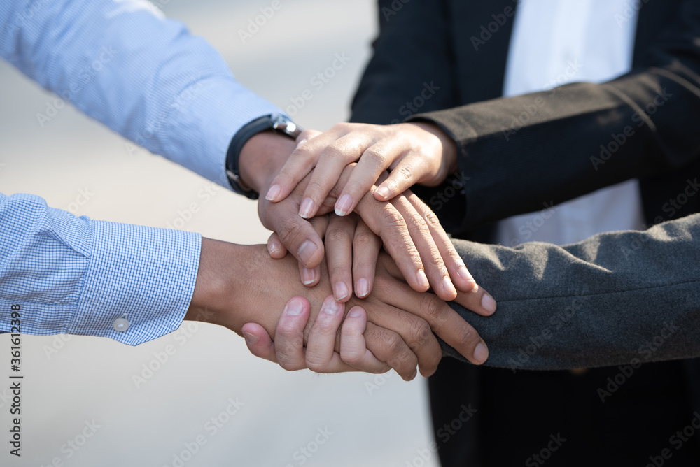 Hold hands to encourage each other and working together. Hold hands to encourage each other and working together.
