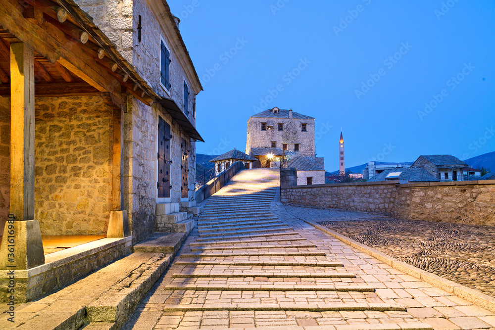 Historical buildings and cobblestone street, at dawn, in Mostar, Bosnia and Herzegovina