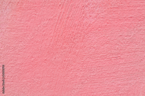 Texture of pink stucco for modern interior. Abstract pink background.