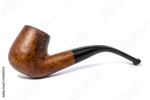 Smoking briar pipe on a white background