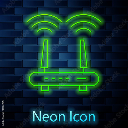 Glowing neon line Router and wi-fi signal icon isolated on brick wall background. Wireless ethernet modem router. Computer technology internet. Vector.