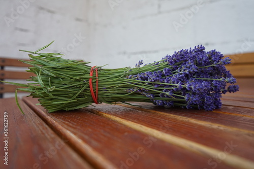 bunch of lavender on wooden table