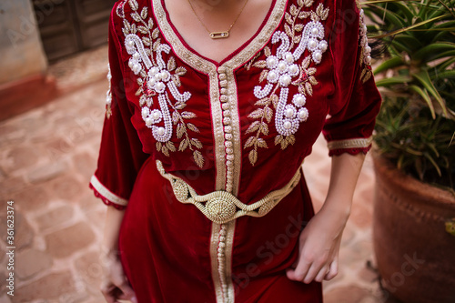 Moroccan traditional dress, embroidery on the caftan photo