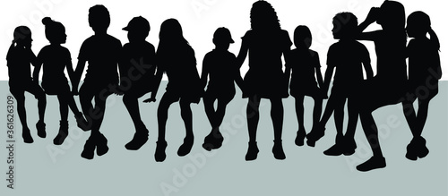 
Black silhouettes of people sitting on a bench