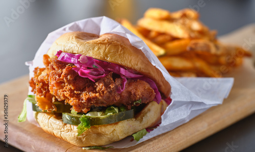 Photography crispy fried chicken sandwich with pickles, coleslaw and mayo