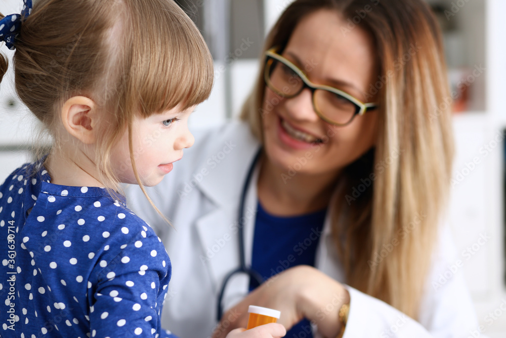 Little child with mother at pediatrician reception. Physical exam cute infant portrait baby aid healthy lifestyle ward round child sickness clinic test high quality and trust concept Little child with mother at pediatrician reception. Physical exam cute infant portrait baby aid healthy lifestyle ward round child sickness clinic test high quality and trust concept