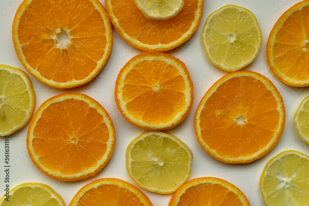 Background with sliced oranges and lemons Background with sliced oranges and lemons