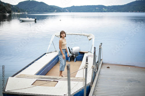 Young woman on the boat © jessica