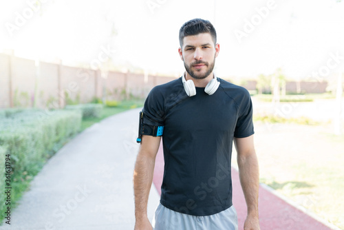 Confident Man In Sportswear At Park © AntonioDiaz
