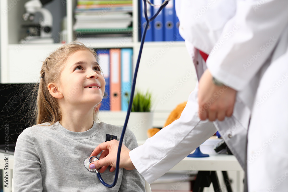 Little child at pediatrician reception. Physical exam appointment cute infant portrait baby aid healthy lifestyle ward round child sickness clinic test high quality and trust concept