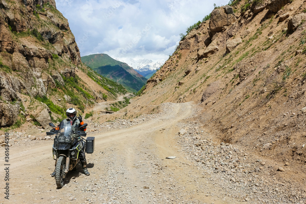 biker on an abandoned mountain road