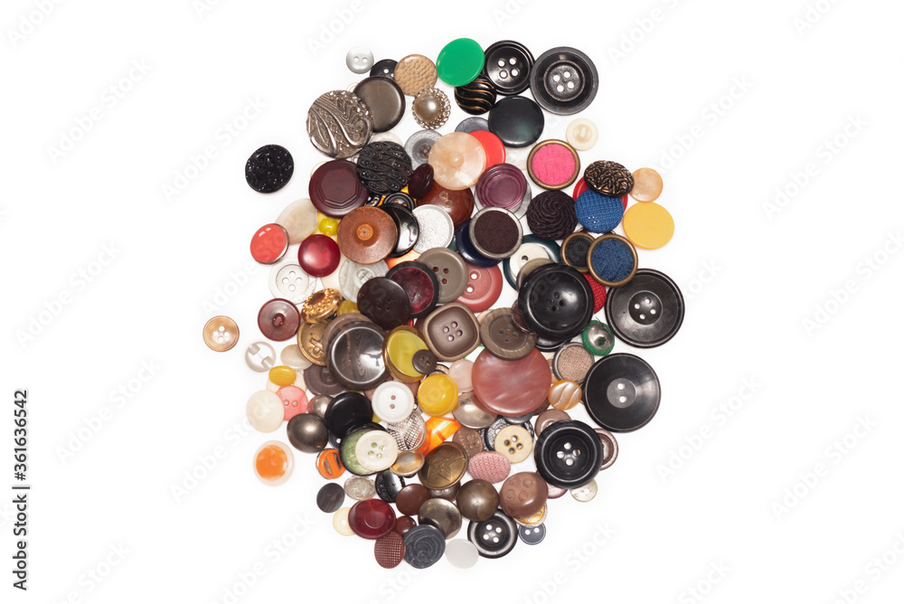 Heap of old buttons collection isolated on the white background. Heap of old buttons collection isolated on the white background.