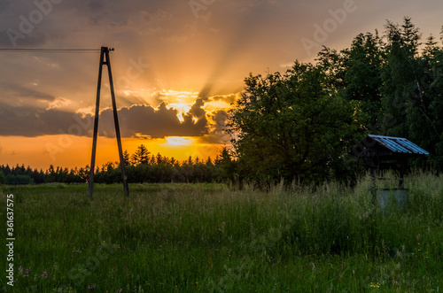Sunset with old well
