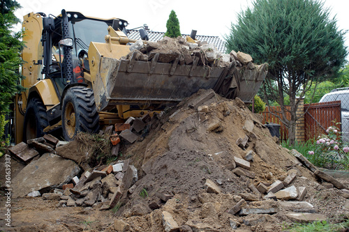 construction works - demolition of the old yard in village