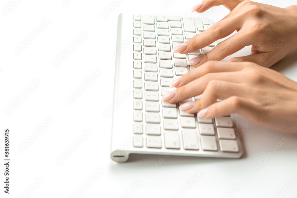 Technology concept isolated. Woman using laptop. Female online work female. Hand typing on desktop office computer keyboard. Home office. Business, career concept Technology concept isolated. Woman using laptop. Female online work female. Hand typing on desktop office computer keyboard. Home office. Business, career concept