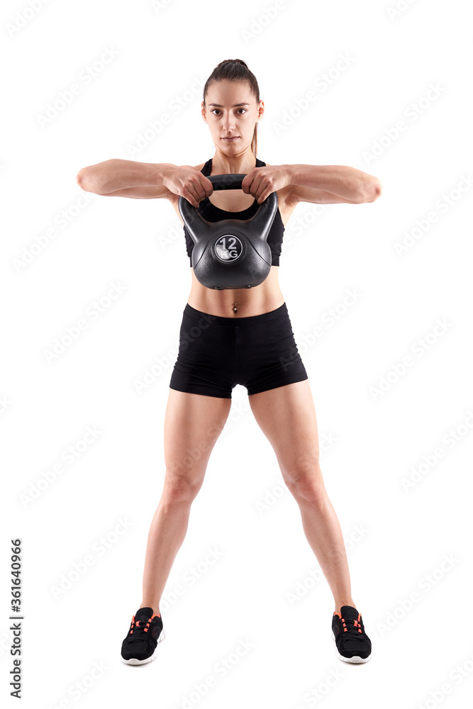 Woman working out with kettlebell