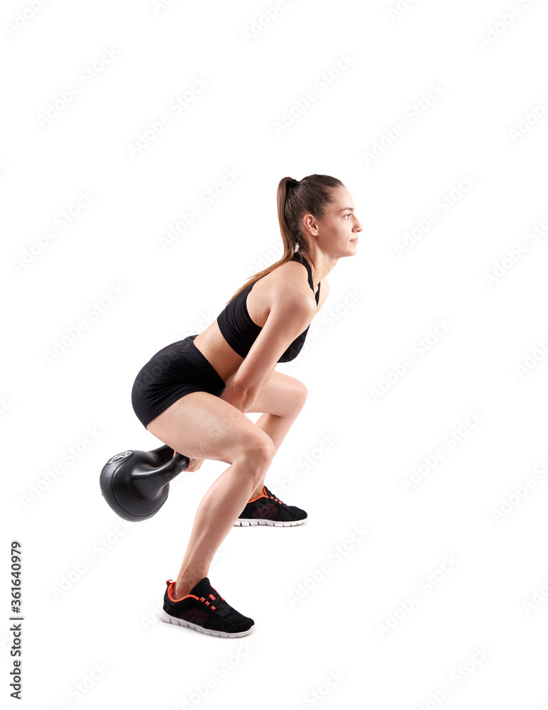 Woman working out with kettlebell