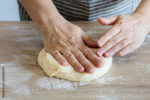 yeast dough and human arms