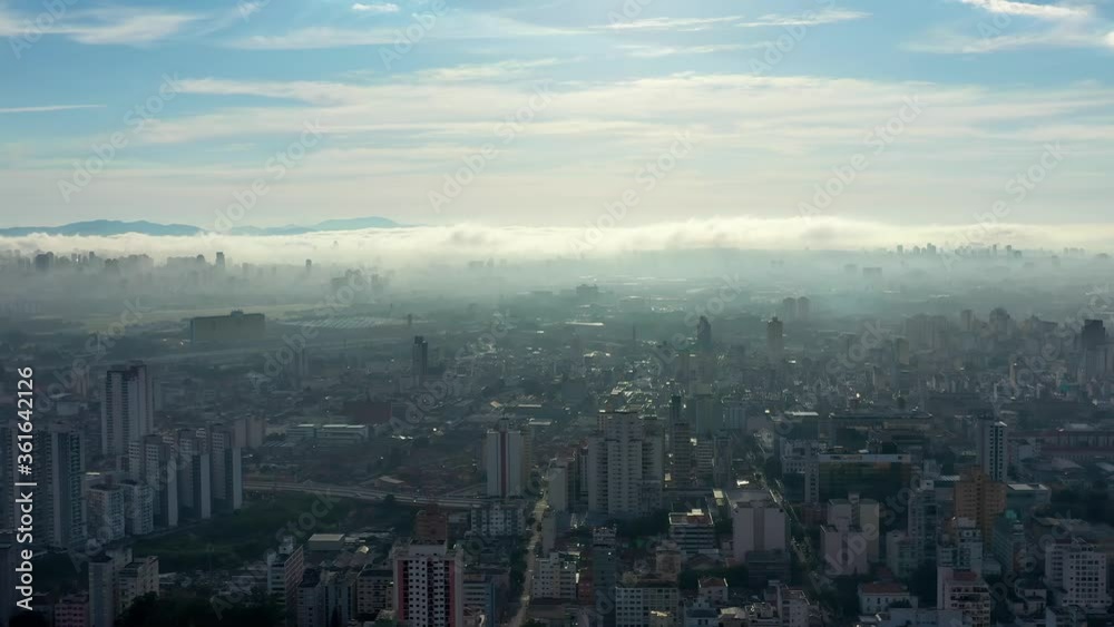 Foggy morning view in the urban city. Cityscape view. Fog landscape. Sunrise view. Foggy morning view in the urban city life scene, Sao Paulo, Brazil. Cityscape view. Fog landscape. Sunrise view. Foggy morning view in the urban city. Cityscape view. Fog landscape. Sunrise view. Foggy morning view in the urban city life scene, Sao Paulo, Brazil. Cityscape view. Fog landscape. Sunrise view.