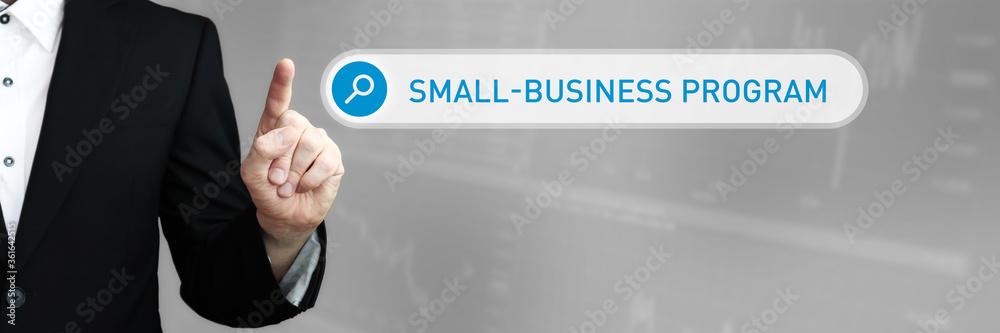 Small-Business Program. Businessman (Man) in a suit pointing with his finger to a search box. The word is in focus. Blue Background. Business, Finance, Statistics, Analysis, Economy Small-Business Program. Businessman (Man) in a suit pointing with his finger to a search box. The word is in focus. Blue Background. Business, Finance, Statistics, Analysis, Economy