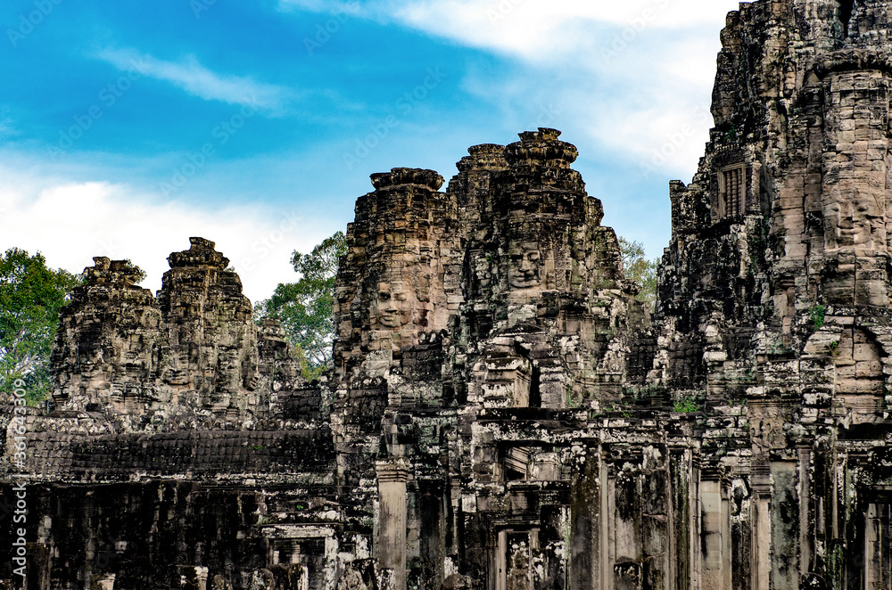 Fototapeta premium SIEM-REAP, CAMBODIA - DECEMBER 10, 2016. Ruined Cambodian Temples of Angkor Complex. Travel Cambodia concept.Ppart of Khmer temple