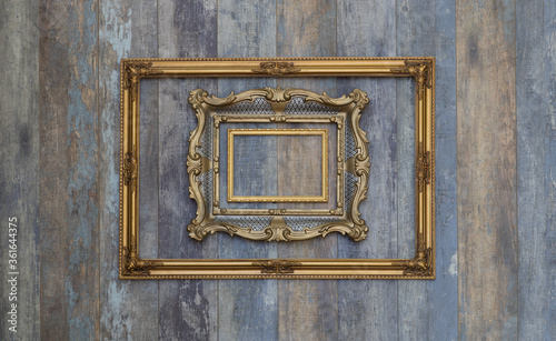 antique museum golden frame collection on old wooden wall