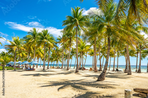 Bohol, Philippines - December 27, 2019: White sand tropical beach of Bohol, Philiipines photo