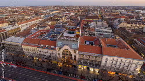 Aerial drone shot of Bubble Bar terrace on rooftop of Budapest building in sunset