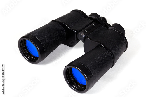 Vintage black binoculars isolated on white background