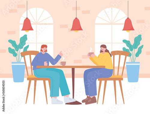 restaurant social distancing  people drinking coffee in the restaurant during quarantine  covid 19 pandemic  prevention of coronavirus infection
