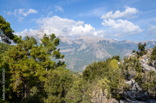 View to mountain ridge in Taurus Mountains  stony hills with rock on green mountain meadow from famous Lycian Way tourist path in Turkey