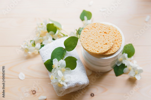 Aroma Spa concept with jasmine flowers on a white wooden background, health care and spa.