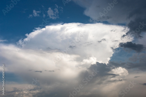 large white cumulus rain cloud