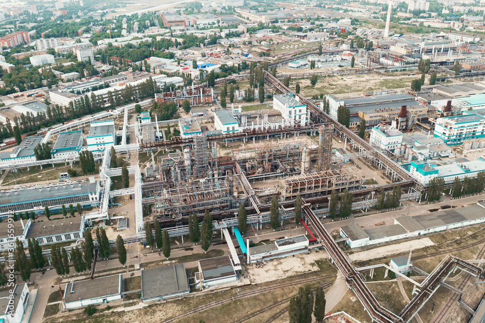 Aerial view oil and gas refinery petrochemical factory, city industrial zone.