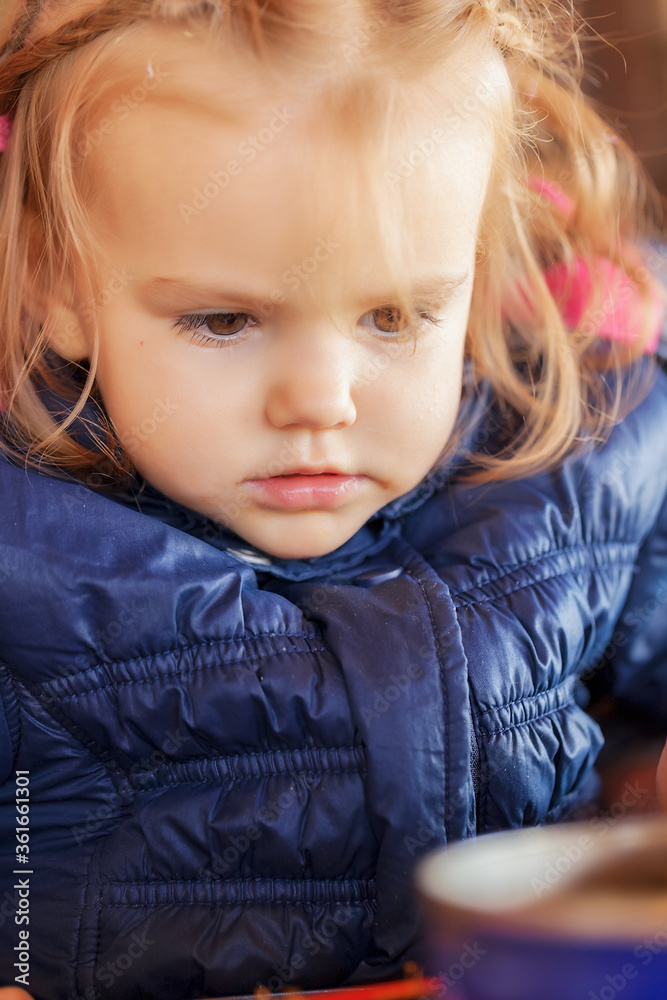child in a jacket