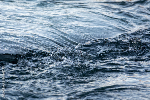 Water running over ice