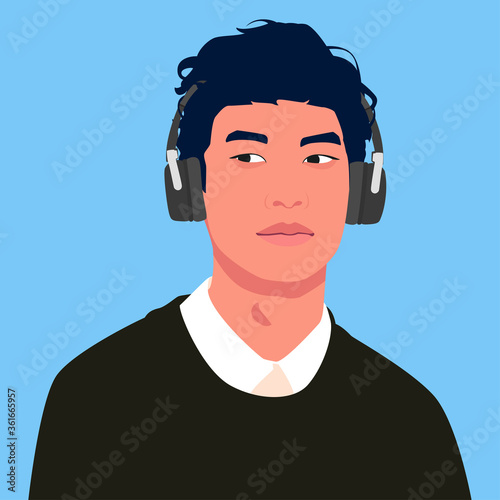 Asian man listen to music on headphones