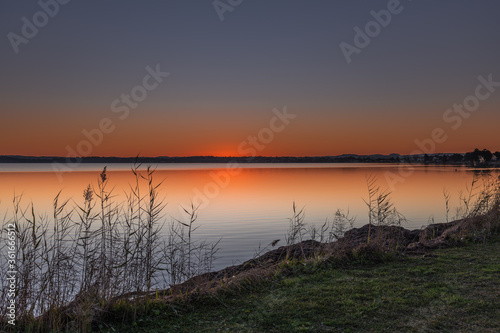 Sunset over the Lake with Clear Skies