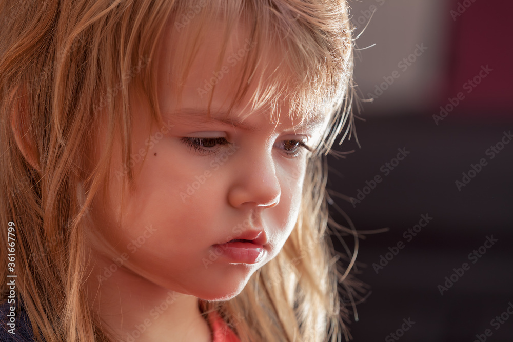 Naklejka premium image of a child from profile