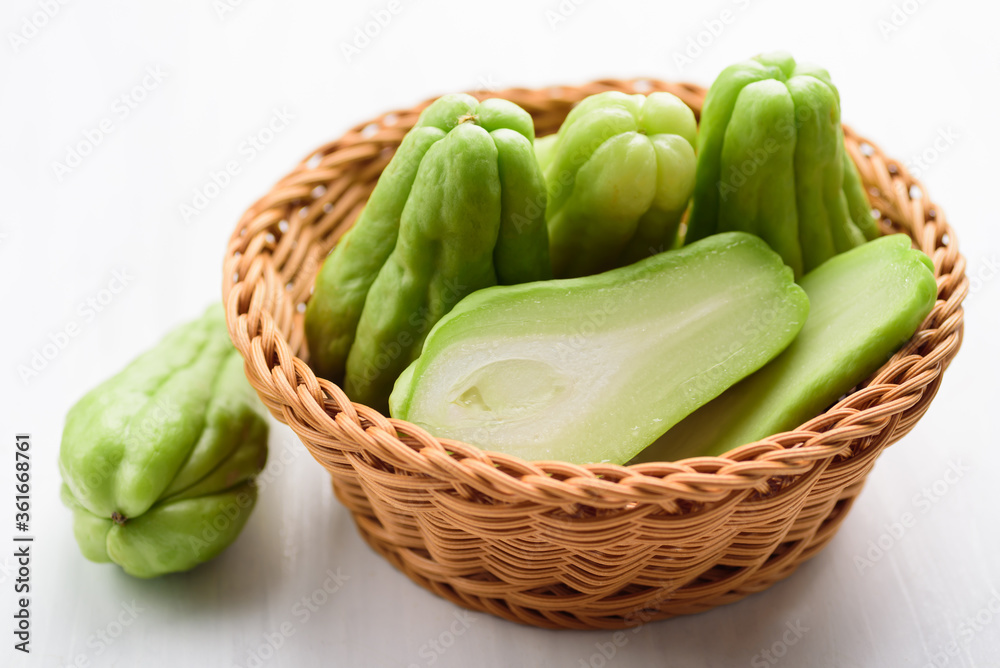 Chayote squash or Mirlition squash in a basket Chayote squash or Mirlition squash in a basket