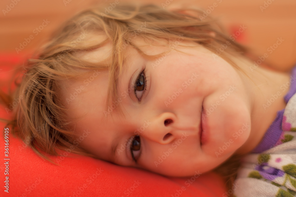 little girl in bed