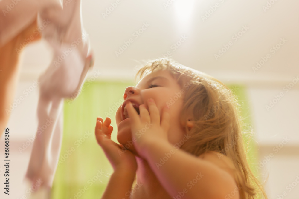 a cute girl playing at home