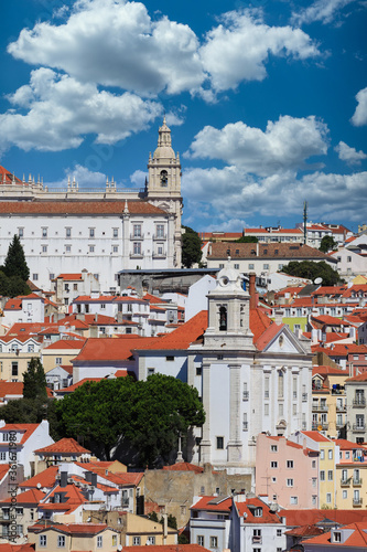 Wallpaper Mural Colorful buildings and red tile rooftops on hills of Lisbon Portugal Torontodigital.ca