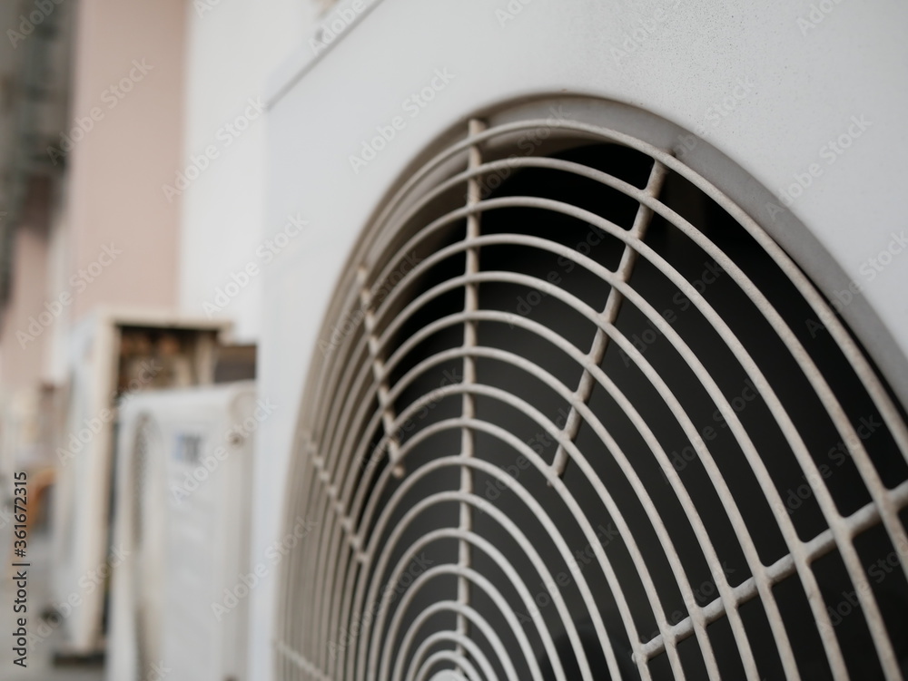 custom made wallpaper toronto digitalcloseup of air conditioner compressor outside building.