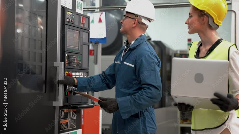 Factory Professional worker and manager inspector on heavy machine ...