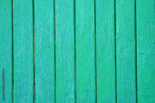  The graphic resource consists of vertical wooden planks in green paint.