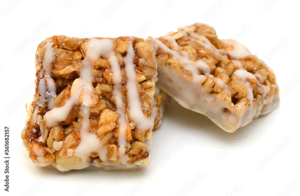 Honey bars with peanuts on white background Honey bars with peanuts on white background
